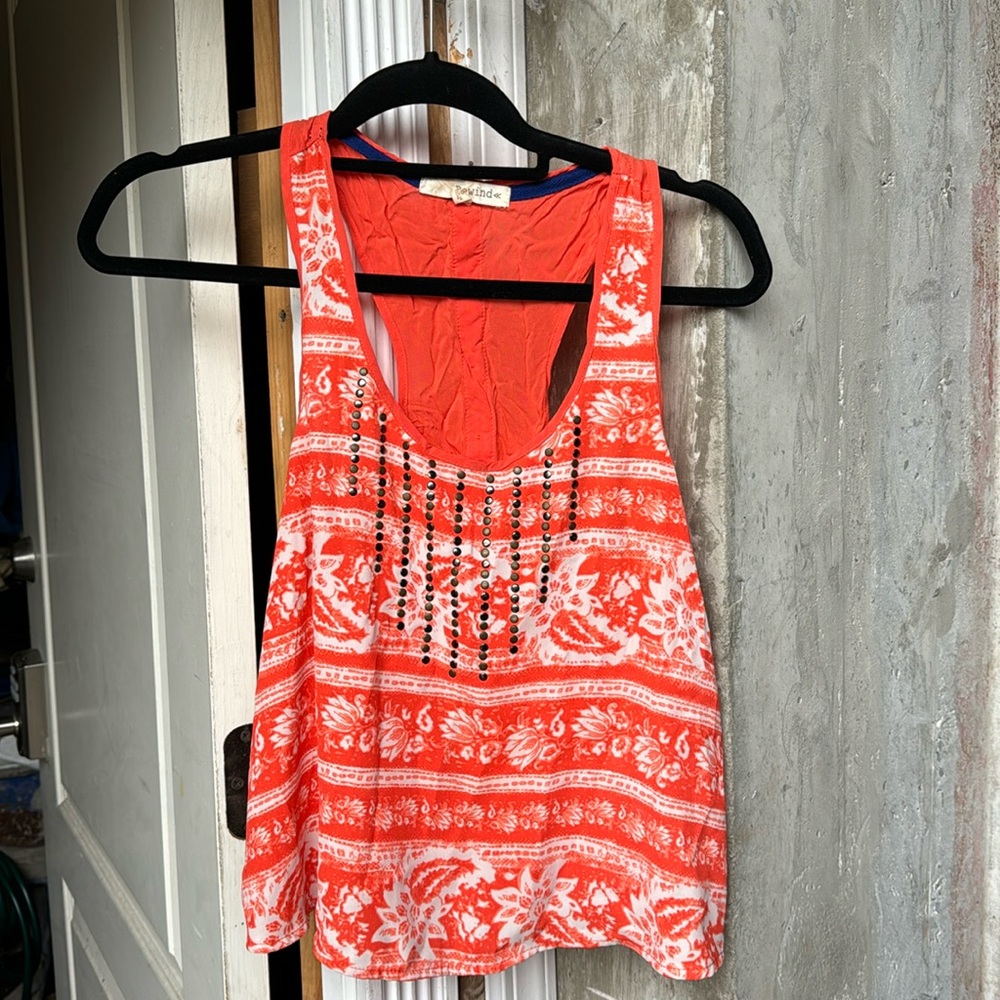 Women’s size, small orange and orange and white racer back top